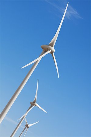 Wind turbines against prairie sky, create green energy. Stock Photo - Budget Royalty-Free & Subscription, Code: 400-04155577