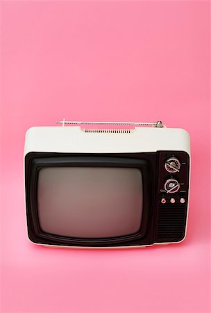 old 12 inch black and white portable television on pink surface Stock Photo - Budget Royalty-Free & Subscription, Code: 400-04155921