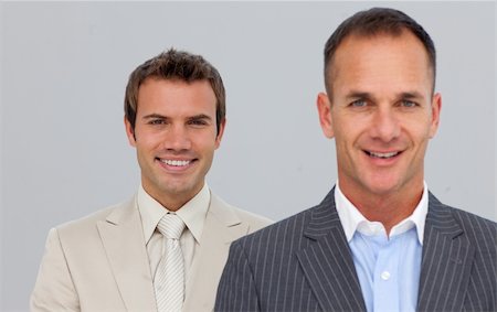 simsearch:400-05118165,k - Portrait of smiling two businessmen with folded arms Foto de stock - Royalty-Free Super Valor e Assinatura, Número: 400-04156366