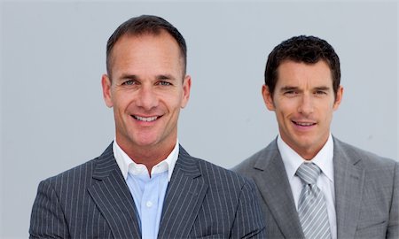 simsearch:400-05118165,k - Portrait of smiling two businessmen with folded arms Foto de stock - Royalty-Free Super Valor e Assinatura, Número: 400-04156369
