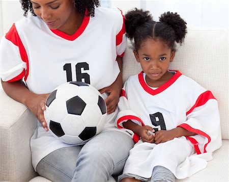 Portrait of a mother and her little girl at home Stock Photo - Budget Royalty-Free & Subscription, Code: 400-04156693