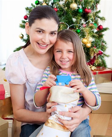 Happy mother and daughter at home at Christmas time Stock Photo - Budget Royalty-Free & Subscription, Code: 400-04156835