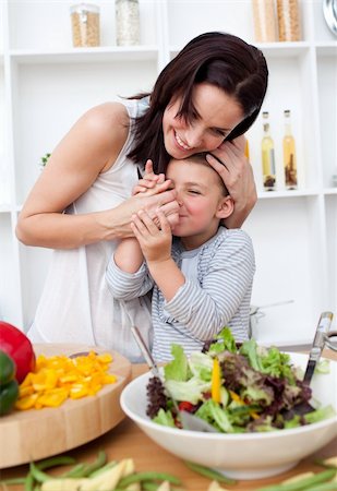 Happy Mother and her little girl having fun in the kitchen Stock Photo - Budget Royalty-Free & Subscription, Code: 400-04157544