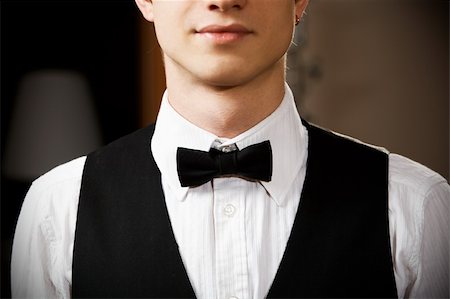 young caucasian waiter is wearing the uniform Stock Photo - Budget Royalty-Free & Subscription, Code: 400-04158078