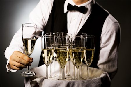 professional waiter in uniform is serving wine Stock Photo - Budget Royalty-Free & Subscription, Code: 400-04158085