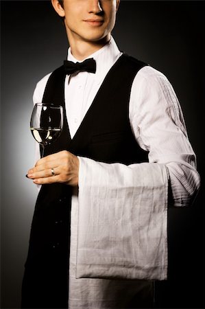 professional waiter in uniform is serving wine Stock Photo - Budget Royalty-Free & Subscription, Code: 400-04158089