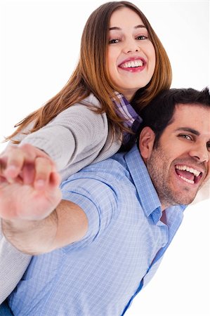 Cute girl enjoying with her boyfriend on a white background Stock Photo - Budget Royalty-Free & Subscription, Code: 400-04158284