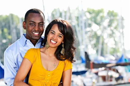 Young romantic couple hugging and standing at harbor Stock Photo - Budget Royalty-Free & Subscription, Code: 400-04158544