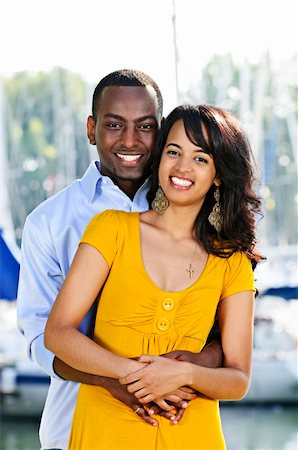 Young romantic couple hugging and standing at harbor Stock Photo - Budget Royalty-Free & Subscription, Code: 400-04158543