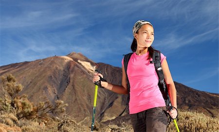 simsearch:400-04044871,k - Female hiker. Young asian female model hiking / backpacking in very scenic and beautiful volcanic landscape on the volcano, Teide, Tenerife, Spain. Photographie de stock - Aubaine LD & Abonnement, Code: 400-04158871