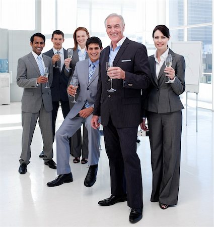 fun team office - Multi-ethnic business people toasting with Champagne Stock Photo - Budget Royalty-Free & Subscription, Code: 400-04159633