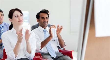 simsearch:400-04159642,k - Close-up of business people clapping at the end of a conference Photographie de stock - Aubaine LD & Abonnement, Code: 400-04159641