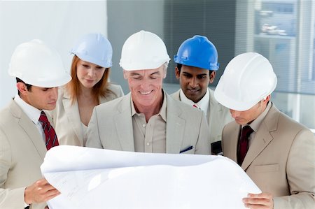 A group of architect discussing a project in a building Stock Photo - Budget Royalty-Free & Subscription, Code: 400-04159654