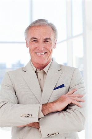 simsearch:400-05118165,k - Close-up of a confident senior businessman with folded arms in a business building Stock Photo - Budget Royalty-Free & Subscription, Code: 400-04159733