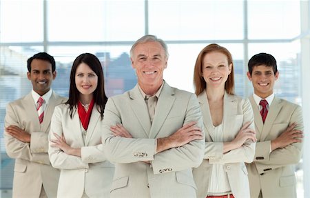 simsearch:400-05118165,k - Portrait of a confident multi-ethnic business team in a business building Stock Photo - Budget Royalty-Free & Subscription, Code: 400-04159746