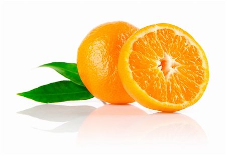 simsearch:400-04164071,k - fresh mandarine fruit with cut and green leaves isolated on white background Stock Photo - Budget Royalty-Free & Subscription, Code: 400-04159957