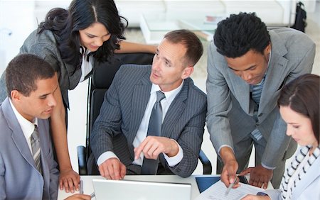 professional group project - Businessteam working together in a business plan in office Stock Photo - Budget Royalty-Free & Subscription, Code: 400-04150233