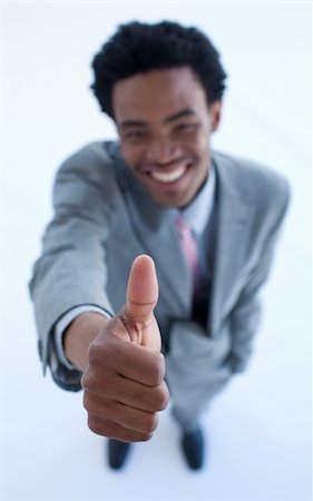 simsearch:400-04129711,k - High Angle of Afro-American successfu lbusinessman with thumb up Stock Photo - Budget Royalty-Free & Subscription, Code: 400-04150264