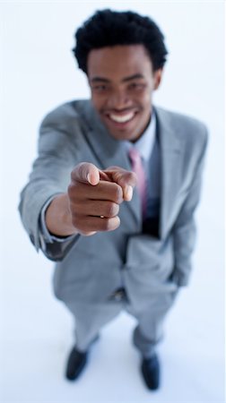 simsearch:400-04129711,k - High Angle of smiling African businessman pointing at the camera Stock Photo - Budget Royalty-Free & Subscription, Code: 400-04150267