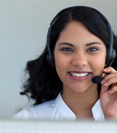 simsearch:400-03990860,k - Portrait of a businesswoman talking on a headset in a call center Photographie de stock - Aubaine LD & Abonnement, Code: 400-04150333