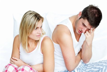 Young lovers together sitting on bed Stock Photo - Budget Royalty-Free & Subscription, Code: 400-04150396