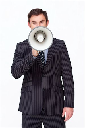 simsearch:400-04126489,k - Handsome businessman shouting through a megaphone agaisnt white Stock Photo - Budget Royalty-Free & Subscription, Code: 400-04150479