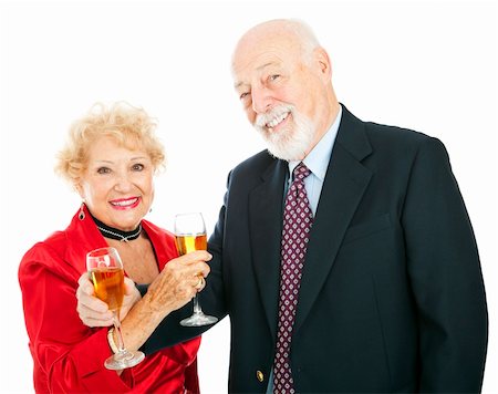simsearch:400-05234340,k - Happy senior couple celebrating New Years or other holiday with champagne.  Isolated on white. Stock Photo - Budget Royalty-Free & Subscription, Code: 400-04150539