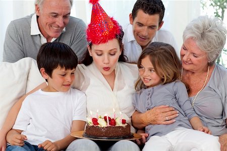 parents and grandparents birthday party - Happy family celebrating mother's birthday at home Stock Photo - Budget Royalty-Free & Subscription, Code: 400-04150735