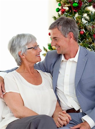 senior woman at christmas parties - Senior couple in love in Christmas at home Stock Photo - Budget Royalty-Free & Subscription, Code: 400-04151107