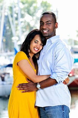 Young romantic couple hugging and standing at harbor Stock Photo - Budget Royalty-Free & Subscription, Code: 400-04151396