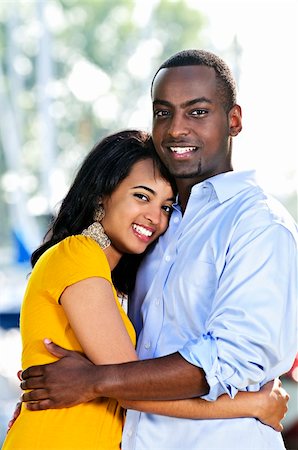 Young romantic couple hugging and standing at harbor Stock Photo - Budget Royalty-Free & Subscription, Code: 400-04151397