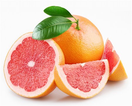 Grapefruits and segments with a leaves on a white background Foto de stock - Royalty-Free Super Valor e Assinatura, Número: 400-04151562