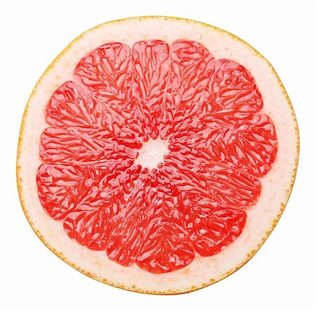 Half of grapefruit on a white background Foto de stock - Royalty-Free Super Valor e Assinatura, Número: 400-04151563
