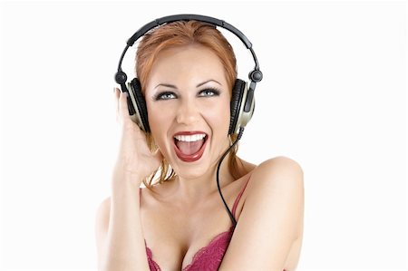 pretty woman laughter party - Shouting bright girl in the ear-phones, isolated on a white background Stock Photo - Budget Royalty-Free & Subscription, Code: 400-04151577