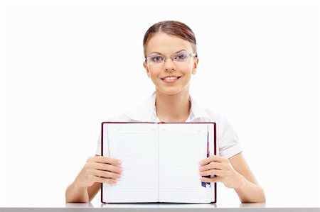 simsearch:400-04204809,k - Attractive business girl shows the blank turn of a weekly journal, isolated Stock Photo - Budget Royalty-Free & Subscription, Code: 400-04151612
