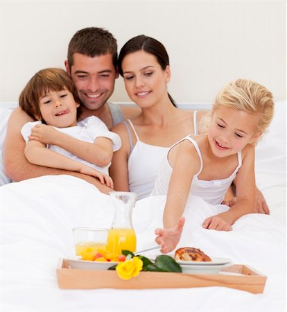 simsearch:400-04878558,k - Happy family having nutritive breakfast in bedroom Stock Photo - Budget Royalty-Free & Subscription, Code: 400-04152084