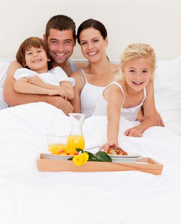 simsearch:400-04878558,k - Happy family having breakfast in the morning Stock Photo - Budget Royalty-Free & Subscription, Code: 400-04152083