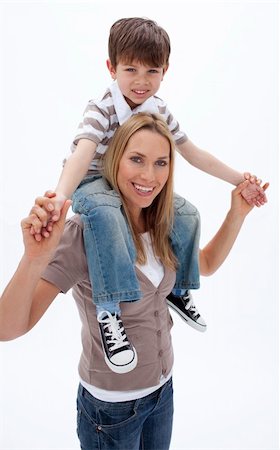 piggyback brothers - Woman giving little boy piggy back ride against white background Stock Photo - Budget Royalty-Free & Subscription, Code: 400-04152284