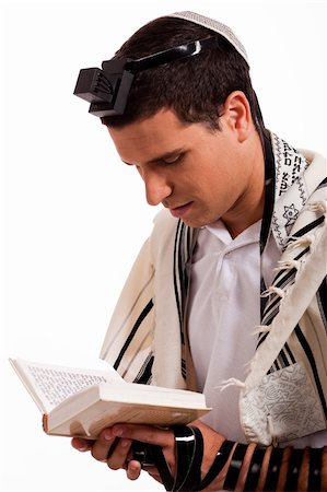 simsearch:400-04152433,k - Close up of a young  jewish man with book on white isolated background Photographie de stock - Aubaine LD & Abonnement, Code: 400-04152429