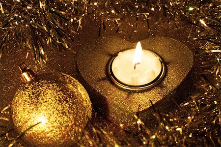 Golden heart candle and Christmas ball in tinsel Stock Photo - Budget Royalty-Free & Subscription, Code: 400-04153334