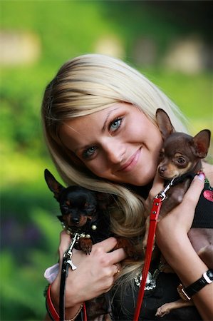 dogs with jewelry - Girl with her friends - cute small dogs Stock Photo - Budget Royalty-Free & Subscription, Code: 400-04153683