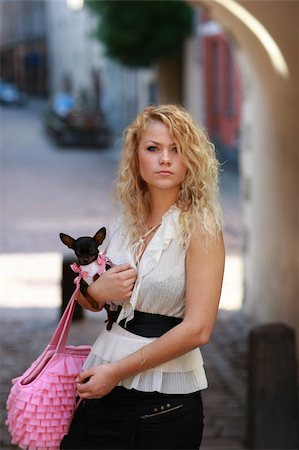 simsearch:400-06758392,k - Fashion - girl and her little friend, small cute dog Photographie de stock - Aubaine LD & Abonnement, Code: 400-04153690