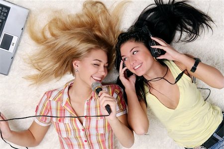 two young girls at home Stock Photo - Budget Royalty-Free & Subscription, Code: 400-04153866