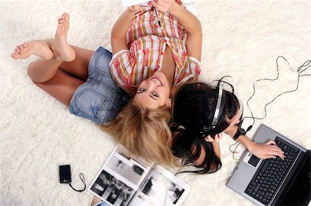 two young girls at home Stock Photo - Budget Royalty-Free & Subscription, Code: 400-04153874