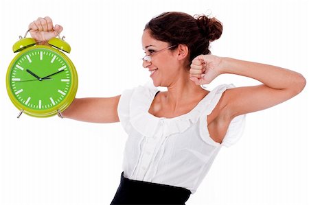 Shot of a Young business woman holding clock on isolated white background Stock Photo - Budget Royalty-Free & Subscription, Code: 400-04164302