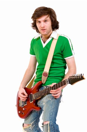 simsearch:400-04165960,k - Guitar player playing his guitar over white background Stock Photo - Budget Royalty-Free & Subscription, Code: 400-04165960