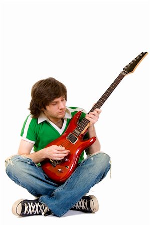 simsearch:400-04165960,k - picture of a seated guitarist playing an electric guitar Stock Photo - Budget Royalty-Free & Subscription, Code: 400-04165961