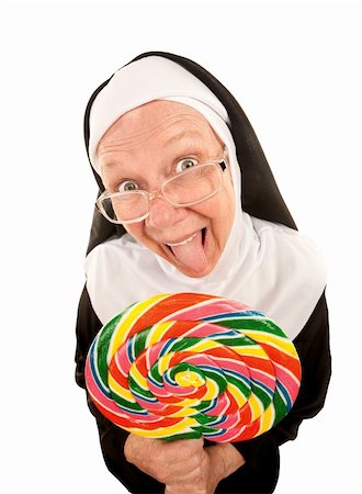 simsearch:400-04671065,k - Funny Nun in Religious Habit Licking Lollipop Stock Photo - Budget Royalty-Free & Subscription, Code: 400-04167365