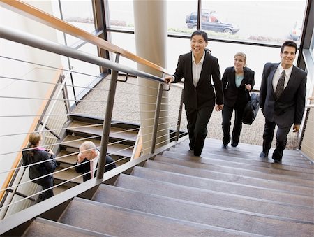 Business people traversing stairs.  Horizontally framed shot. Stock Photo - Budget Royalty-Free & Subscription, Code: 400-04167516