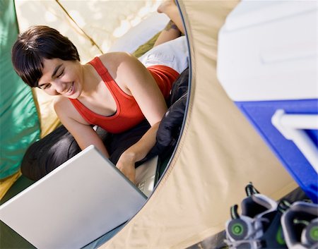 simsearch:400-04168729,k - Woman using laptop in tent Stock Photo - Budget Royalty-Free & Subscription, Code: 400-04167736